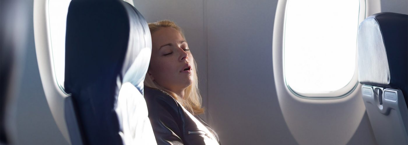 This Is Why You Can't Sleep on the Plane | SmarterTravel