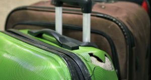 Why Your Checked Luggage Gets So Beat-Up