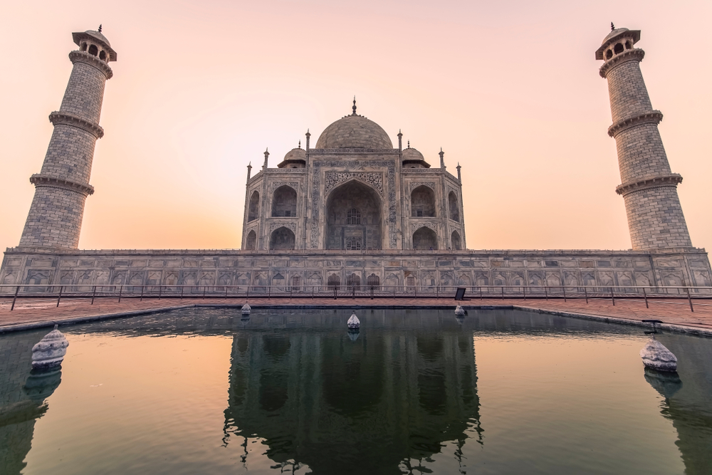 Reflection of the taj mahal at sunrise