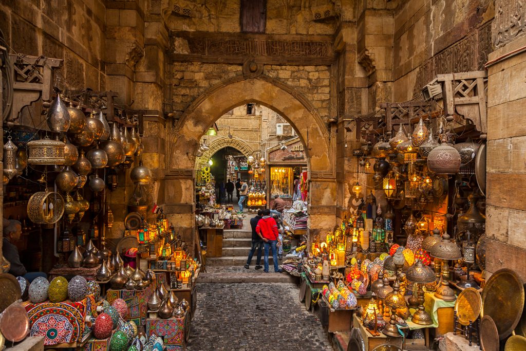 Shoppers browsing at khan el khalili market in cairo, egypt