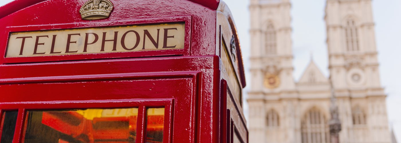 UK, London, Phone booth with Westminster Abbey behind DO NOT USE