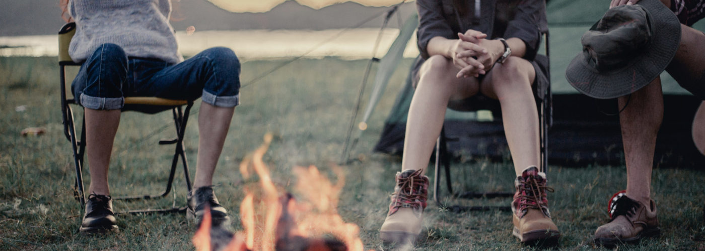 People sitting around a campfire