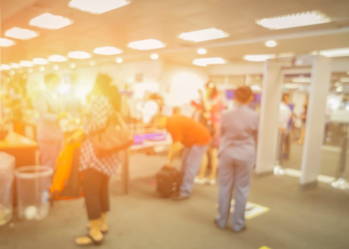 Blurry photo of airport security checkpoint