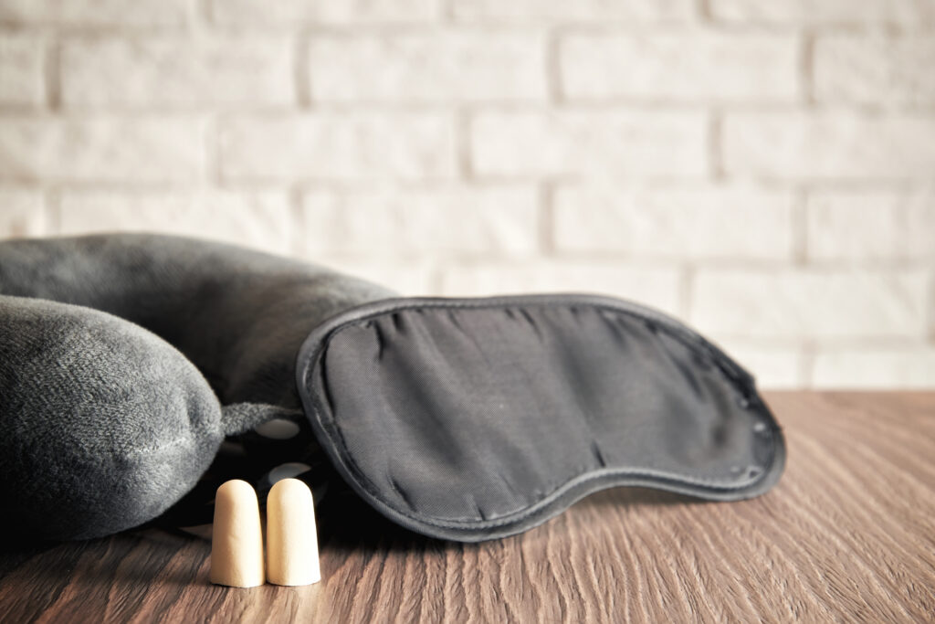 Sleep mask, ear plugs, and airplane pillow 