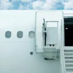 Airplane with stairs exit extended