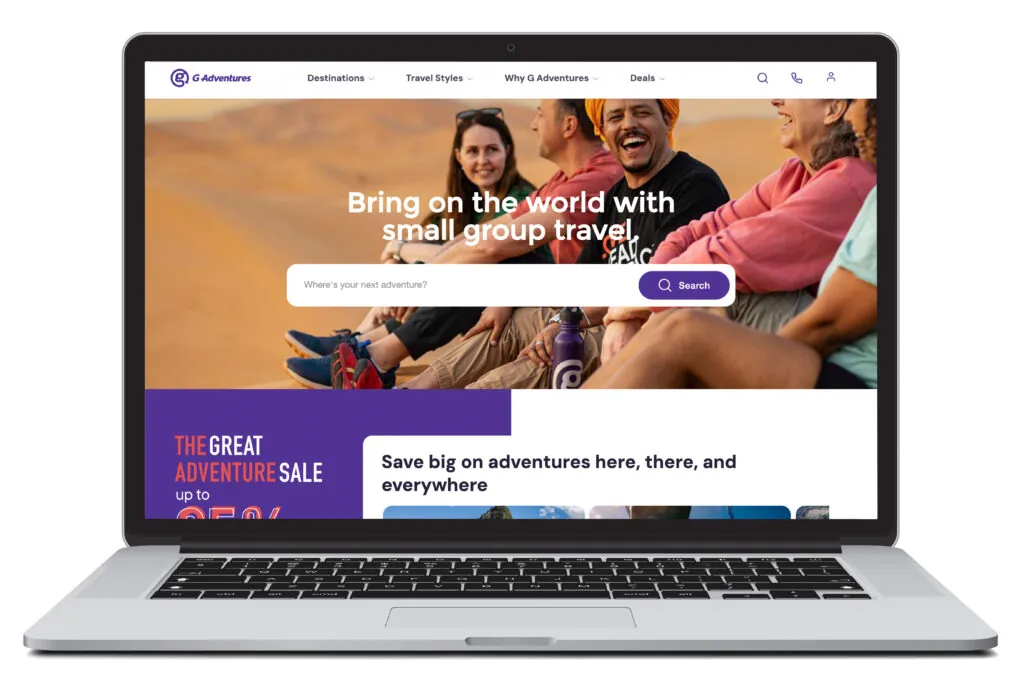 Open laptop showing homepage of G Adventures, a place where you can book last minute group travel